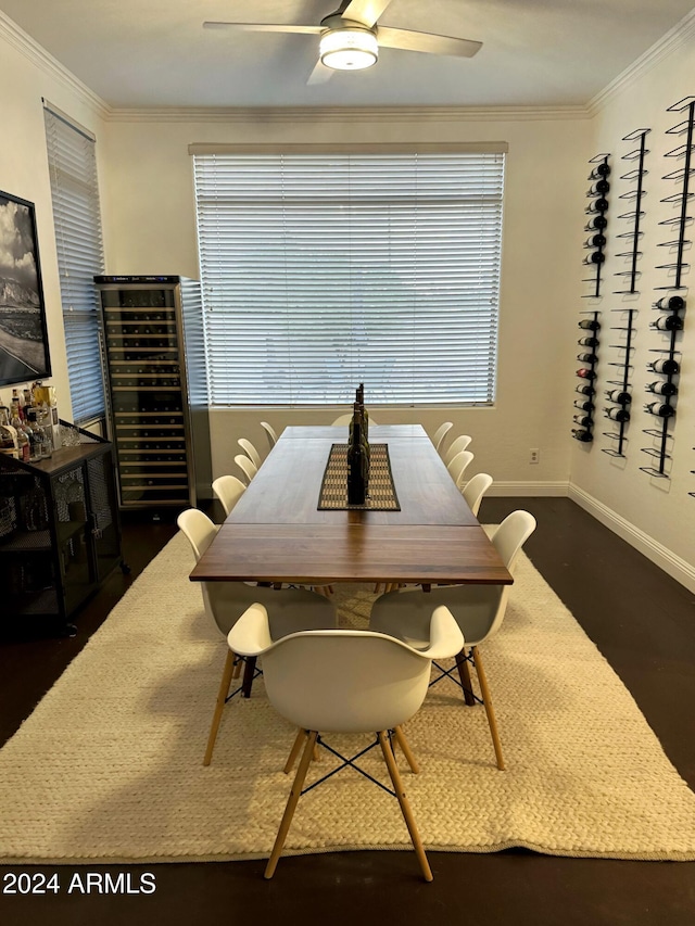 dining area featuring ceiling fan and ornamental molding