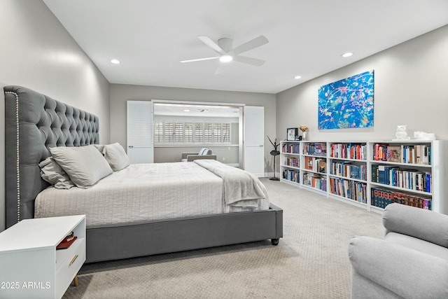 carpeted bedroom featuring ceiling fan