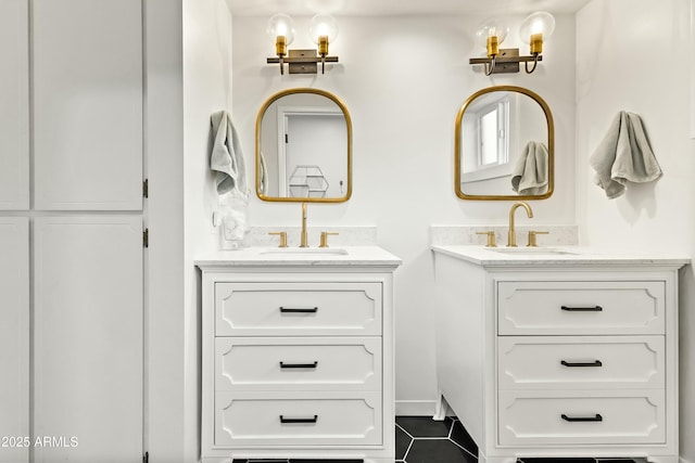 bathroom with vanity and tile patterned flooring