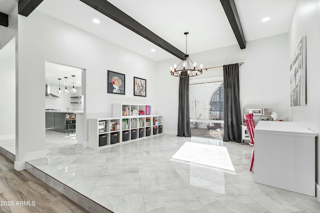 foyer entrance featuring beam ceiling and an inviting chandelier