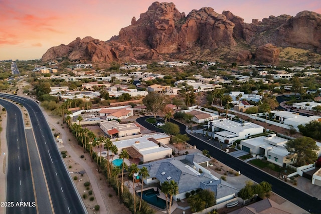 aerial view at dusk with a mountain view