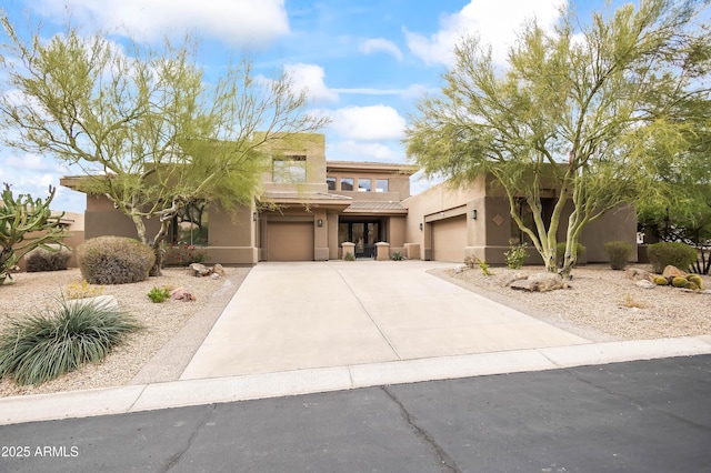 view of front of property featuring a garage