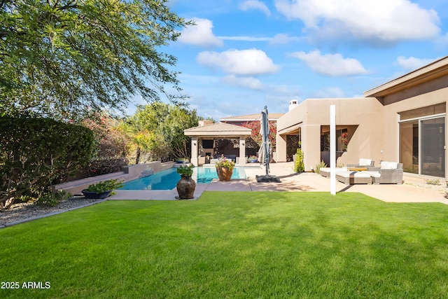 exterior space featuring a gazebo, a lawn, an outdoor hangout area, and a patio