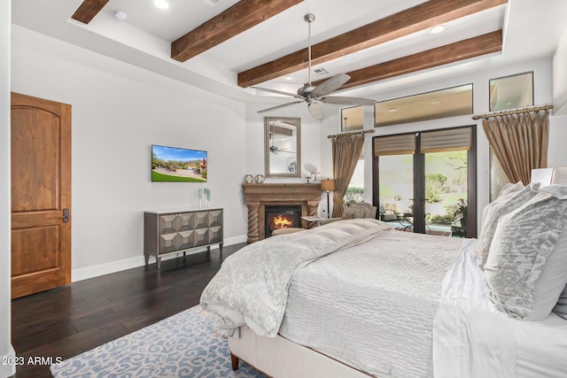 bedroom featuring dark hardwood / wood-style floors, ceiling fan, and access to exterior