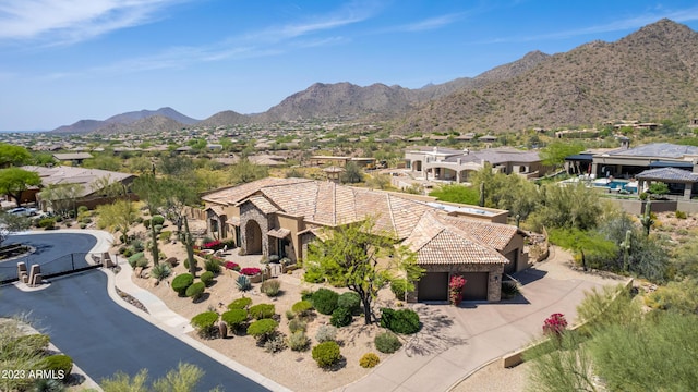 bird's eye view with a mountain view