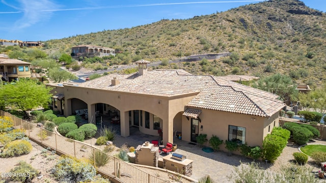 back of house featuring a patio