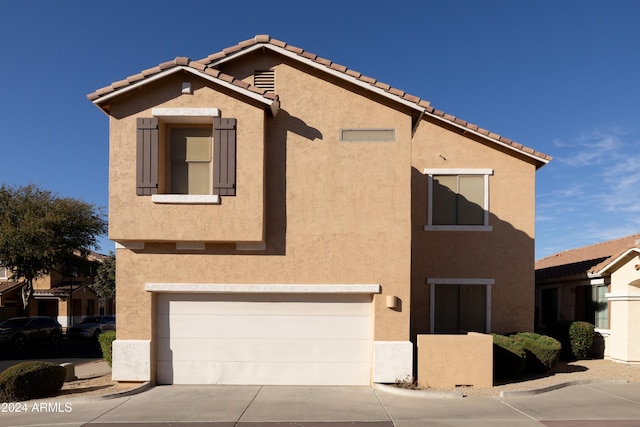 view of front of home featuring a garage