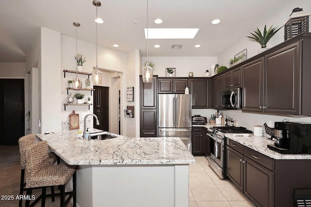 6937 E Purple Shade Cir, Scottsdale, AZ 85266 - kitchen with appliances with stainless steel finishes, a skylight, open shelves, a sink, and a peninsula