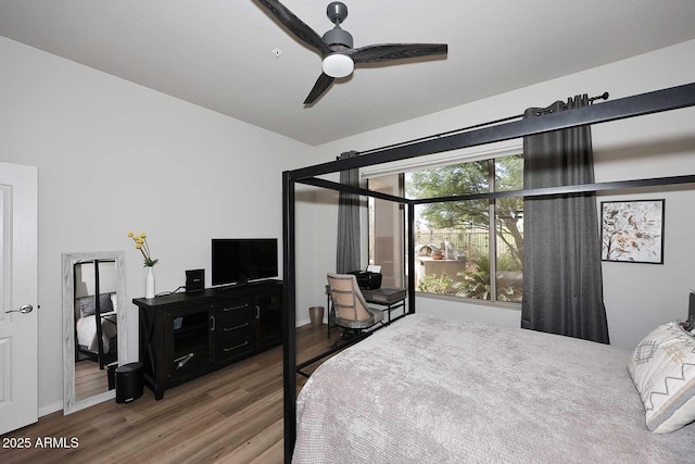 6937 E Purple Shade Cir, Scottsdale, AZ 85266 - bedroom with wood finished floors and ceiling fan