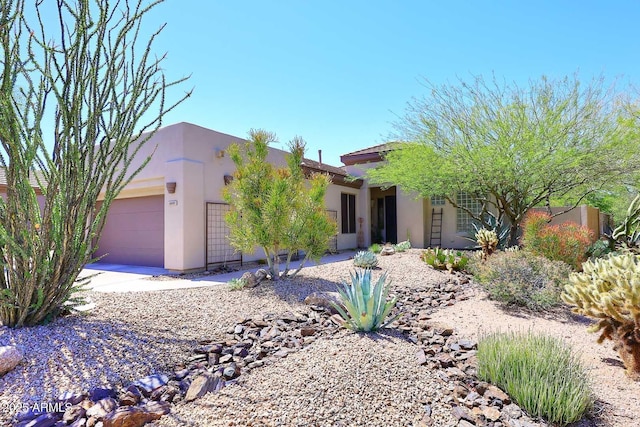 6937 E Purple Shade Cir, Scottsdale, AZ 85266 - view of front of home featuring stucco siding and an attached garage