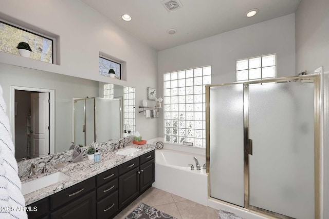 6937 E Purple Shade Cir, Scottsdale, AZ 85266 - full bath with a shower stall, a bath, double vanity, tile patterned floors, and recessed lighting