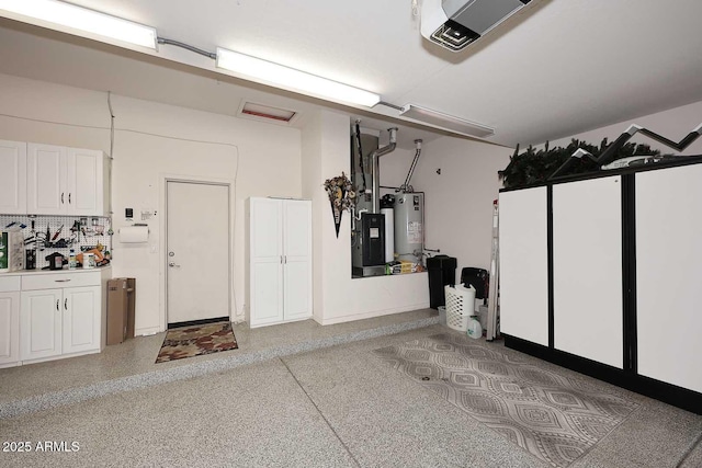6937 E Purple Shade Cir, Scottsdale, AZ 85266 - garage with gas water heater and a garage door opener