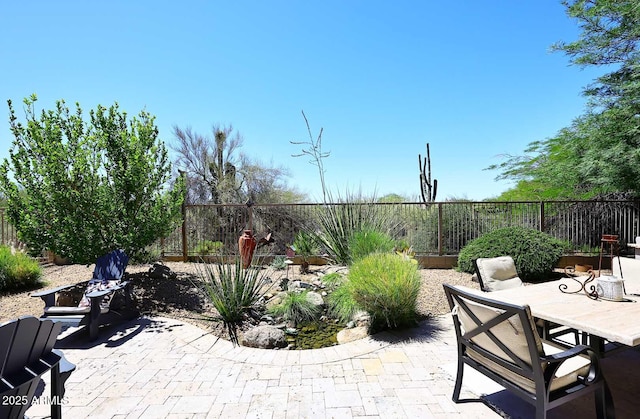 6937 E Purple Shade Cir, Scottsdale, AZ 85266 - fenced backyard featuring a patio and outdoor dining space