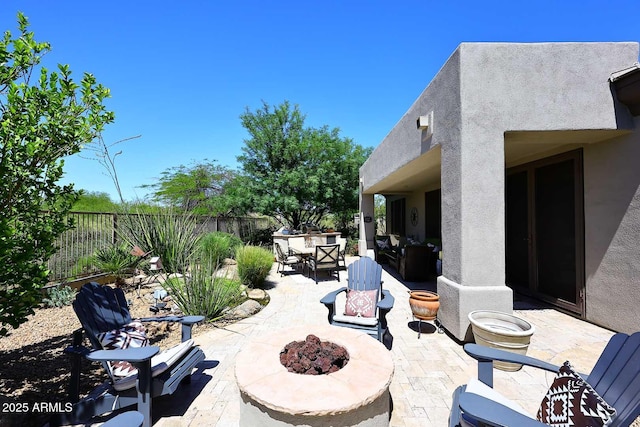 6937 E Purple Shade Cir, Scottsdale, AZ 85266 - fenced backyard featuring a patio and an outdoor fire pit