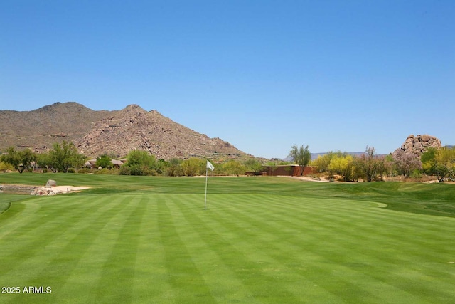 6937 E Purple Shade Cir, Scottsdale, AZ 85266 - view of community with view of golf course, a mountain view, and a yard