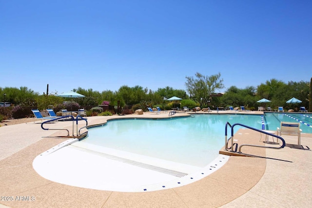 6937 E Purple Shade Cir, Scottsdale, AZ 85266 - community pool featuring a patio