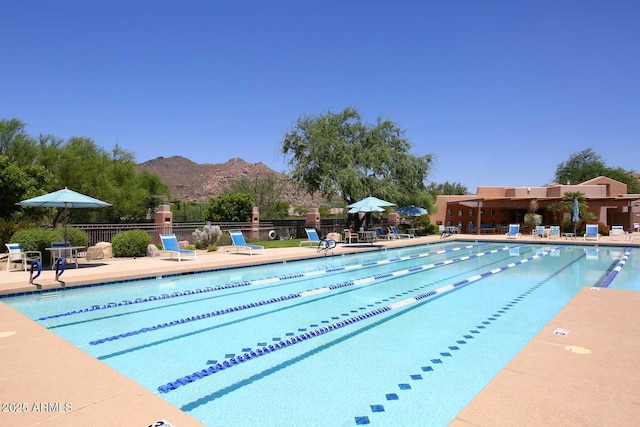 6937 E Purple Shade Cir, Scottsdale, AZ 85266 - community pool with a mountain view and a patio area