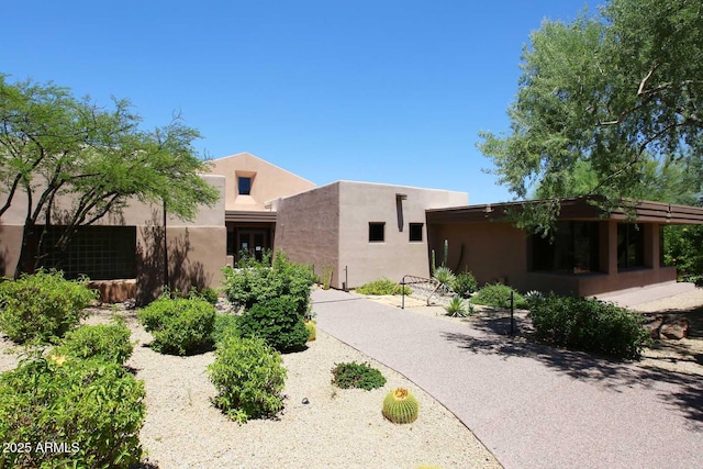 6937 E Purple Shade Cir, Scottsdale, AZ 85266 - pueblo-style house with stucco siding
