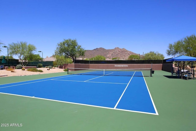6937 E Purple Shade Cir, Scottsdale, AZ 85266 - view of tennis court featuring community basketball court and a mountain view
