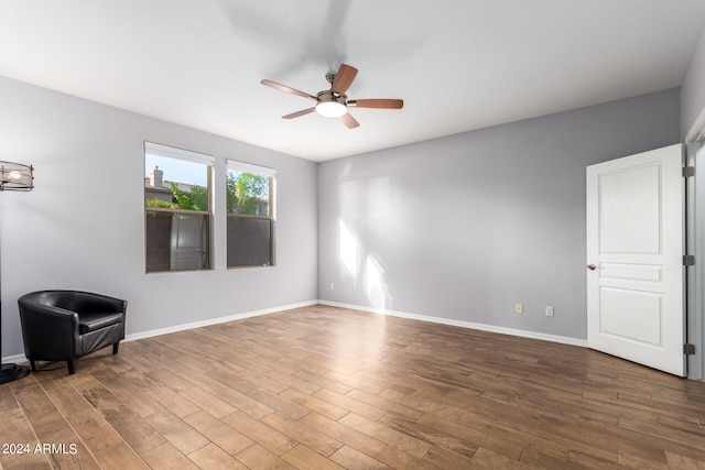 unfurnished room featuring wood-type flooring and ceiling fan