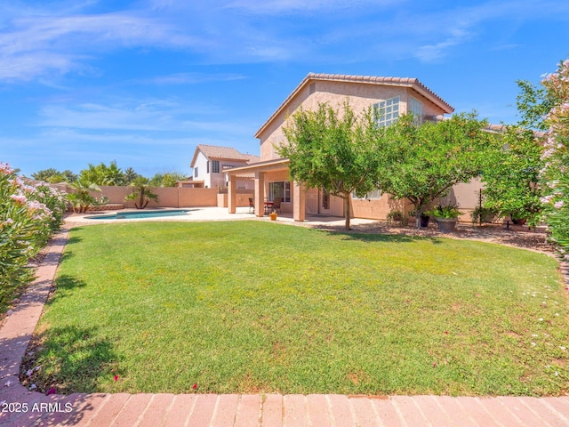 981 N Quail Ln, Gilbert, AZ 85233 - fenced backyard with a patio