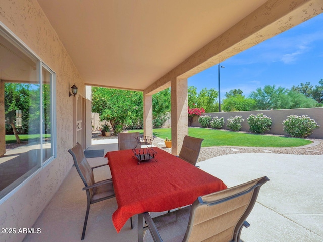 981 N Quail Ln, Gilbert, AZ 85233 - fenced backyard with a patio and outdoor dining area