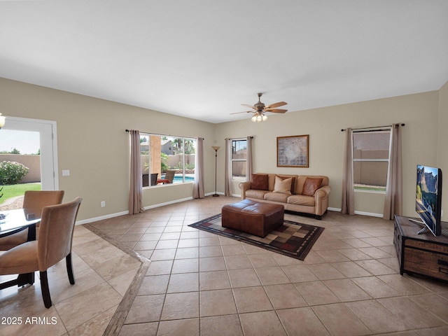 981 N Quail Ln, Gilbert, AZ 85233 - living area with light tile patterned flooring and ceiling fan