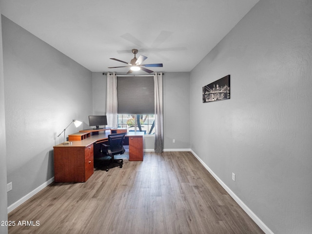 981 N Quail Ln, Gilbert, AZ 85233 - home office with wood finished floors and ceiling fan