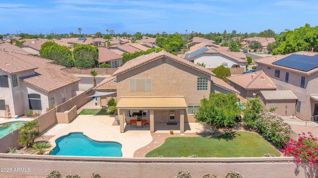 981 N Quail Ln, Gilbert, AZ 85233 - outdoor pool with a residential view, a patio, and a fenced backyard