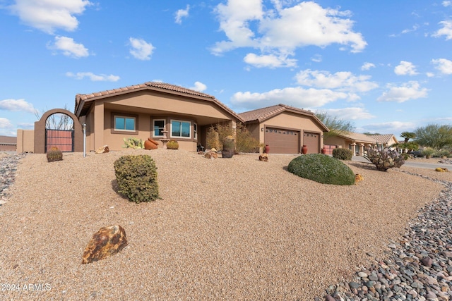 view of front of property with a garage