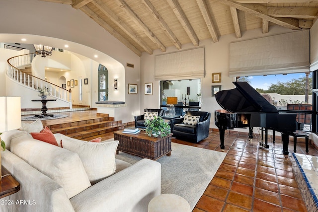 tiled living room with beam ceiling, high vaulted ceiling, wooden ceiling, and a notable chandelier