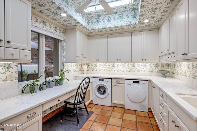 laundry room featuring ceiling fan, light tile patterned floors, crown molding, and washer / clothes dryer