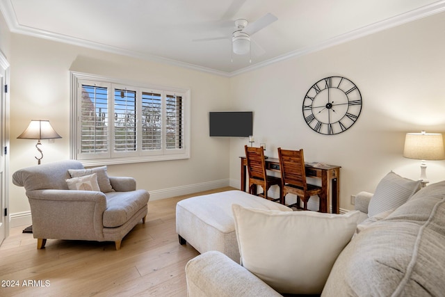 living room with ceiling fan, light hardwood / wood-style flooring, and ornamental molding