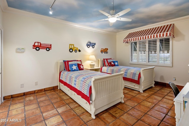 bedroom with ceiling fan and ornamental molding