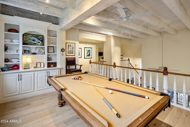 game room featuring built in shelves, beam ceiling, pool table, and light hardwood / wood-style flooring