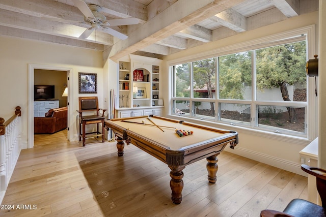 recreation room with ceiling fan, plenty of natural light, built in features, and pool table