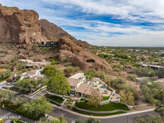 birds eye view of property featuring a mountain view