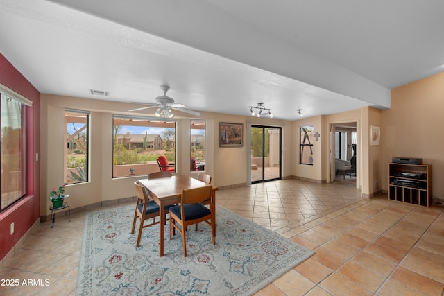 5552 S Feather Bush Ct, Gold Canyon, AZ 85118 - dining space featuring ceiling fan, light tile patterned floors, baseboards, and visible vents