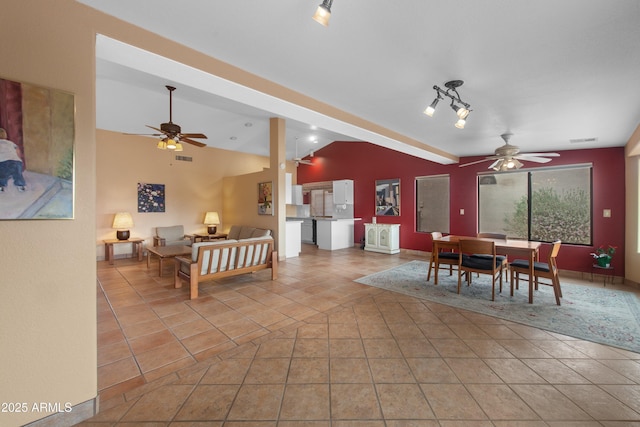 5552 S Feather Bush Ct, Gold Canyon, AZ 85118 - dining room with light tile patterned floors, a ceiling fan, and lofted ceiling