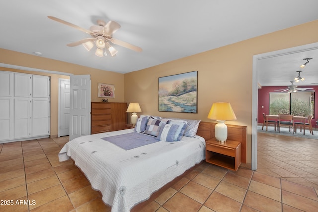 5552 S Feather Bush Ct, Gold Canyon, AZ 85118 - bedroom with light tile patterned floors and a ceiling fan