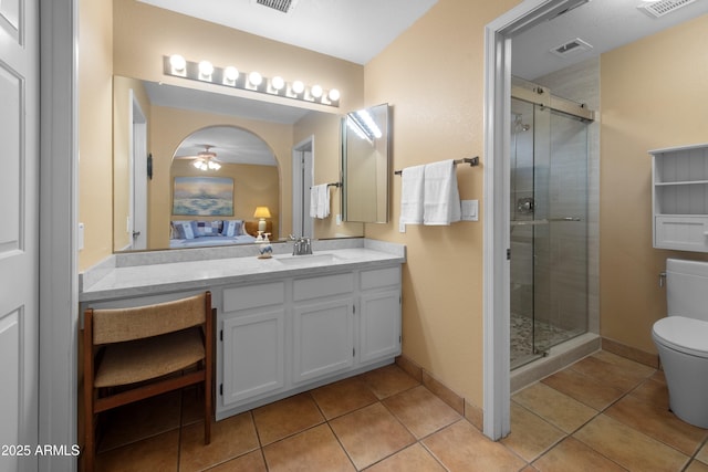 5552 S Feather Bush Ct, Gold Canyon, AZ 85118 - full bath featuring visible vents, toilet, ensuite bath, tile patterned floors, and a stall shower