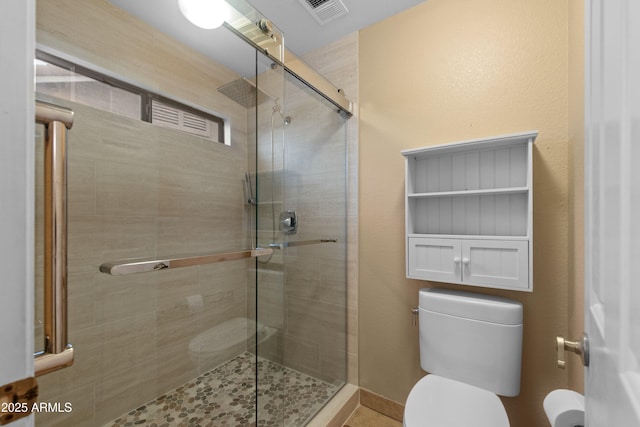 5552 S Feather Bush Ct, Gold Canyon, AZ 85118 - bathroom featuring a shower stall, visible vents, and toilet
