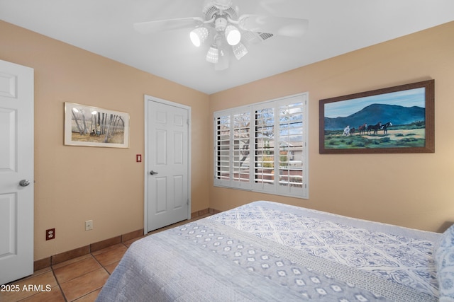 5552 S Feather Bush Ct, Gold Canyon, AZ 85118 - bedroom with tile patterned floors, baseboards, and ceiling fan