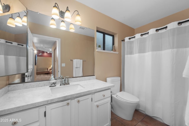 5552 S Feather Bush Ct, Gold Canyon, AZ 85118 - bathroom with visible vents, toilet, tile patterned flooring, and vanity