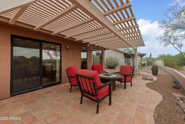 5552 S Feather Bush Ct, Gold Canyon, AZ 85118 - view of patio / terrace with an outdoor fire pit and fence