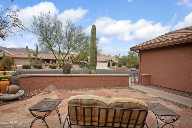 5552 S Feather Bush Ct, Gold Canyon, AZ 85118 - view of patio / terrace with fence and a gate