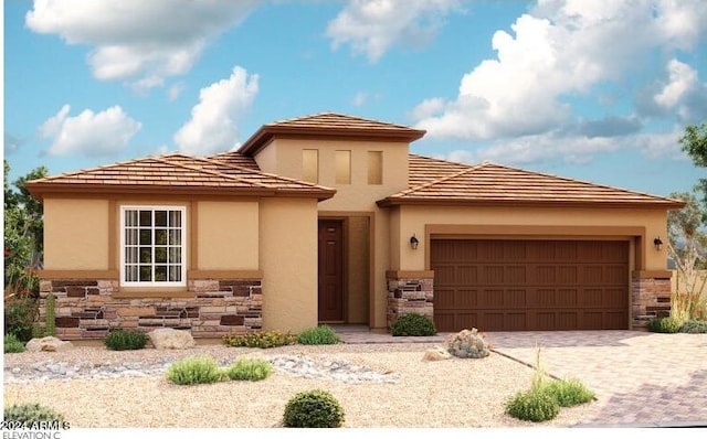 prairie-style house featuring a garage