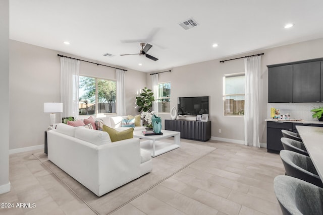 living room with ceiling fan