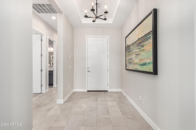 entrance foyer with an inviting chandelier