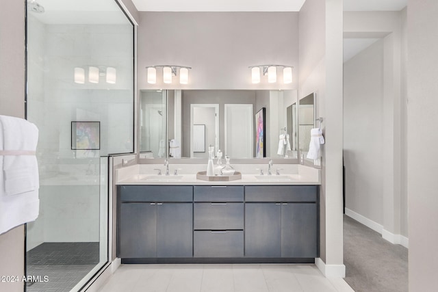 bathroom featuring vanity and a tile shower